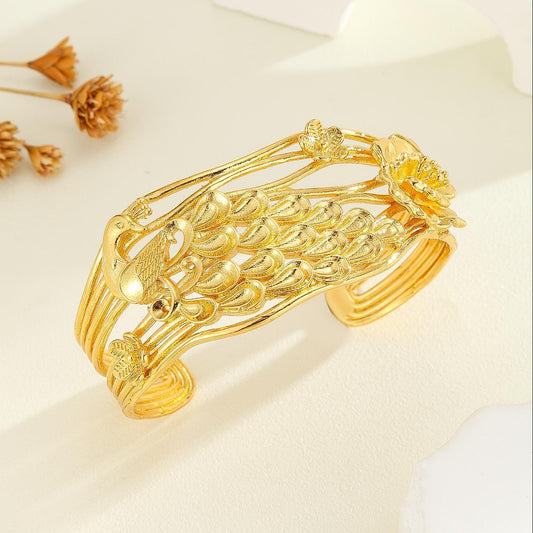Vintage Gold Carved Peacock & Floral Bracelet – Luxury Textured Bangle